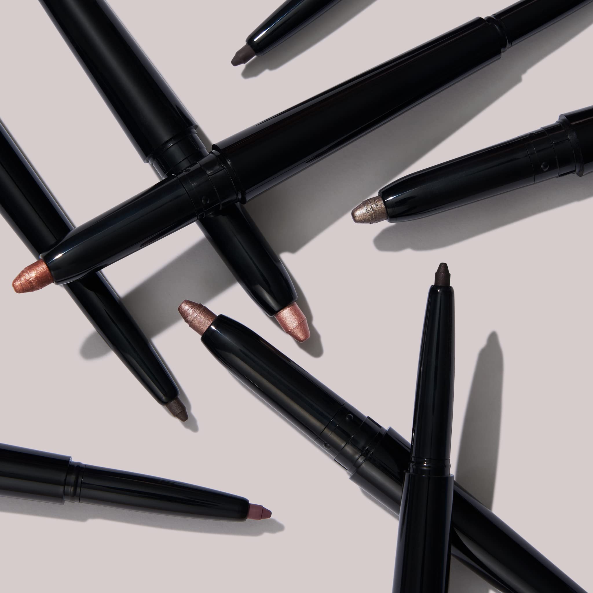 LAURA GELLER size comparison next to mascara showing travel-friendly