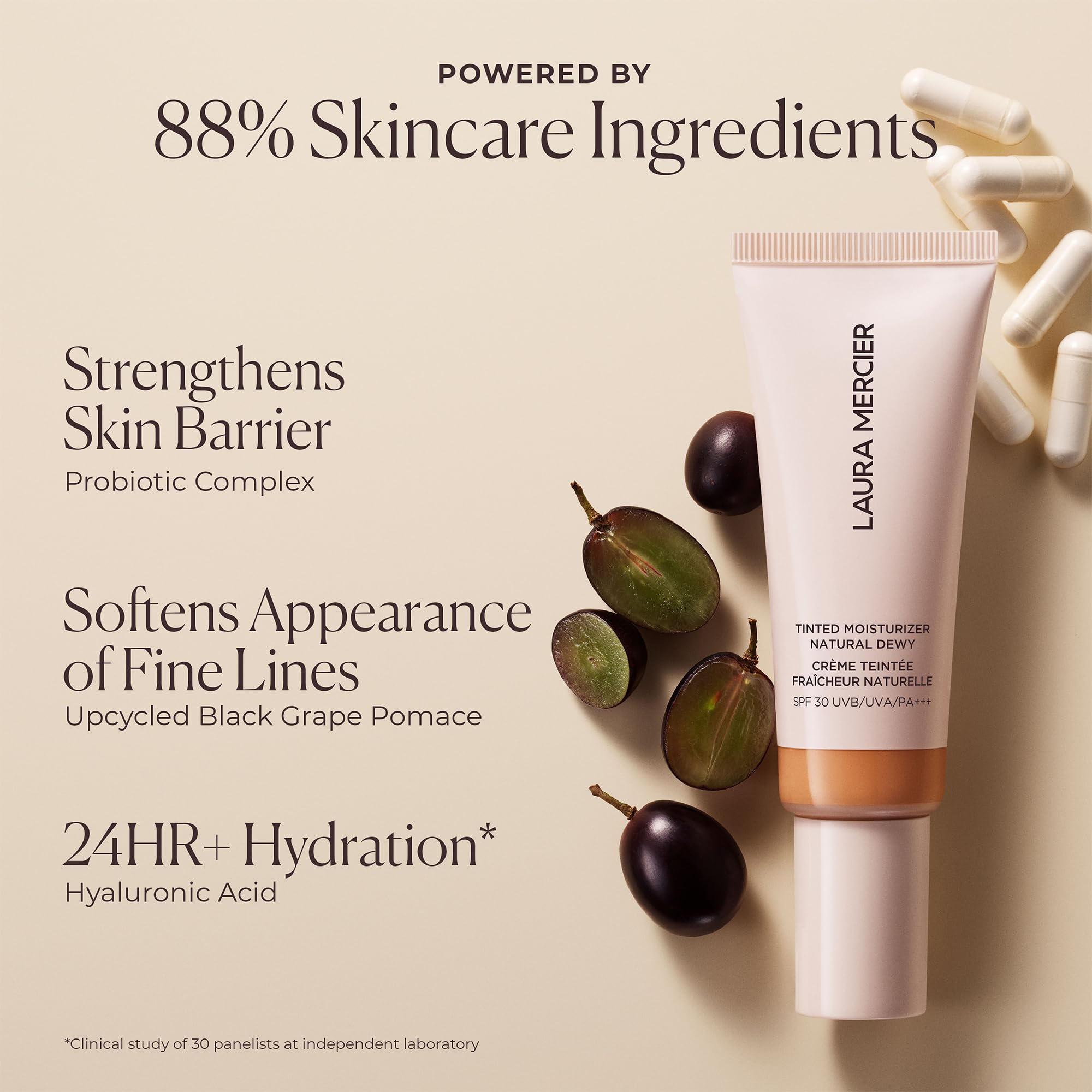 Laura Mercier applying tinted moisturizer with fingers for quick, seamless blend