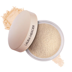Laura Mercier front packaging showing translucent ultra-blur powder benefits