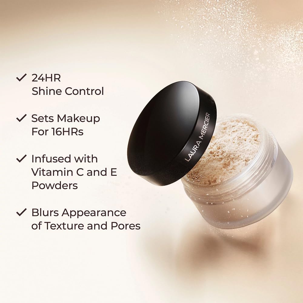 Laura Mercier velour puff pressing powder onto skin for long-wear setting