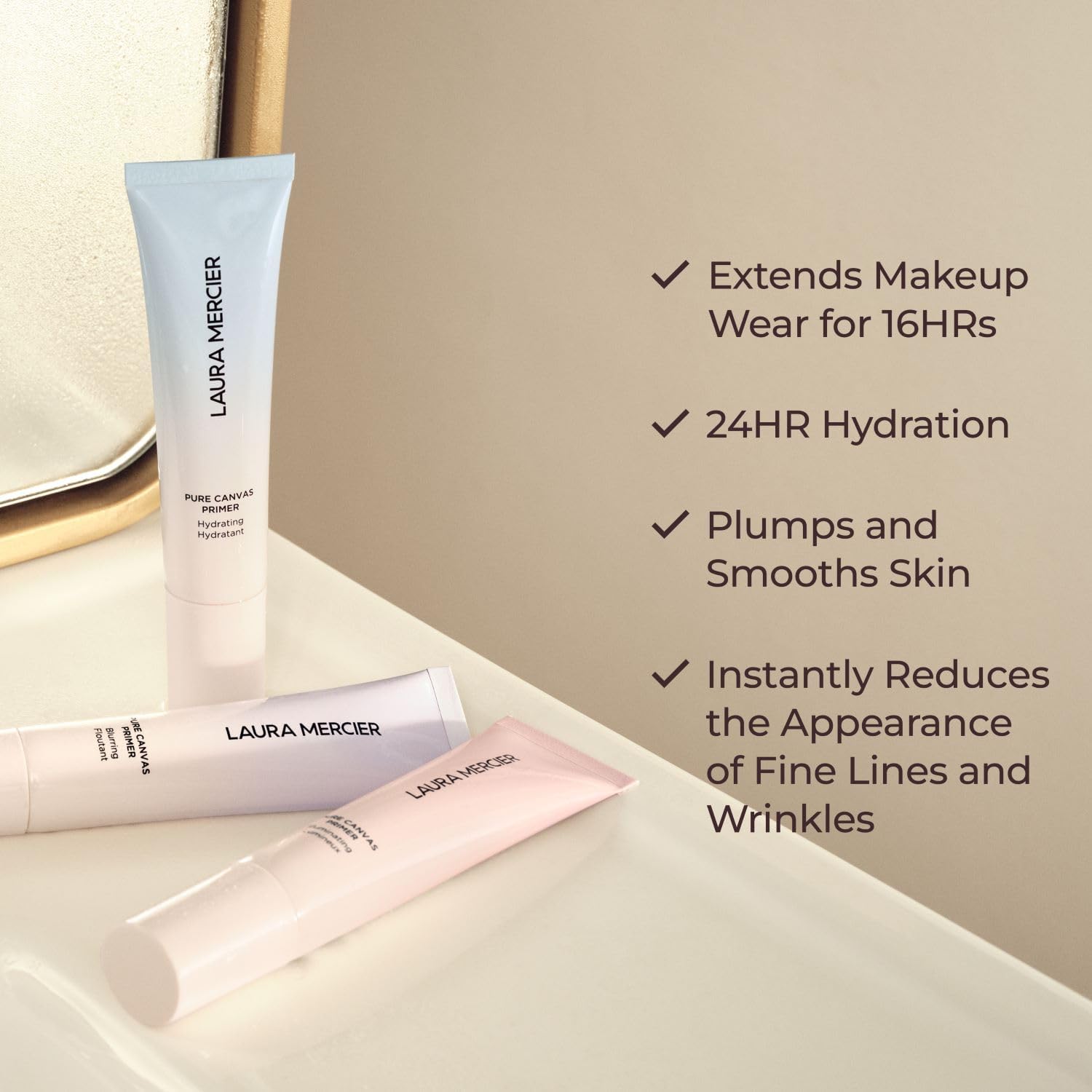 Laura Mercier primer in hand for size comparison and pocketable design