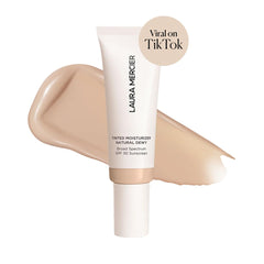 Laura Mercier texture close-up revealing dewy cream consistency for hydrating finish