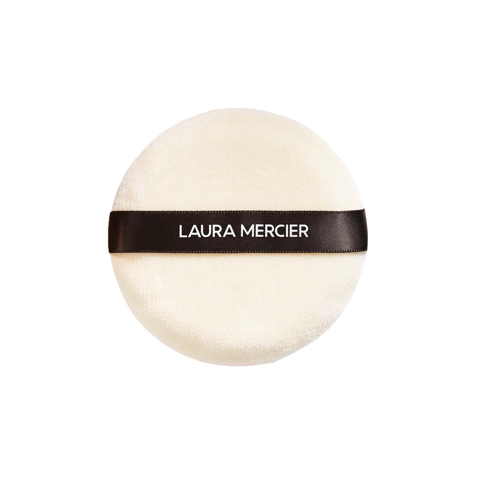 Laura Mercier velour puff front view showing clean edge and plush finish for precise application