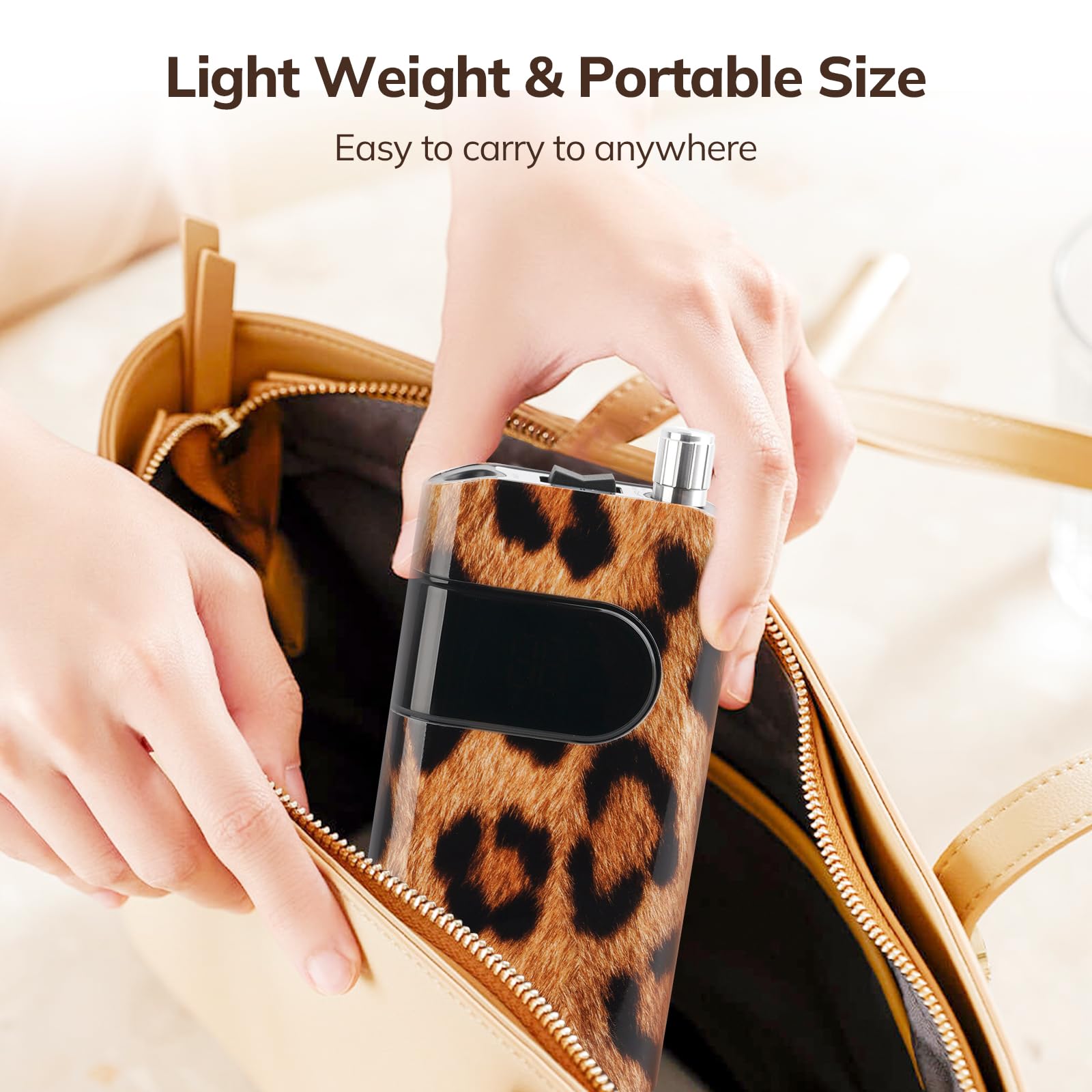 Lavinda next to a hand for scale showing compact travel-friendly size