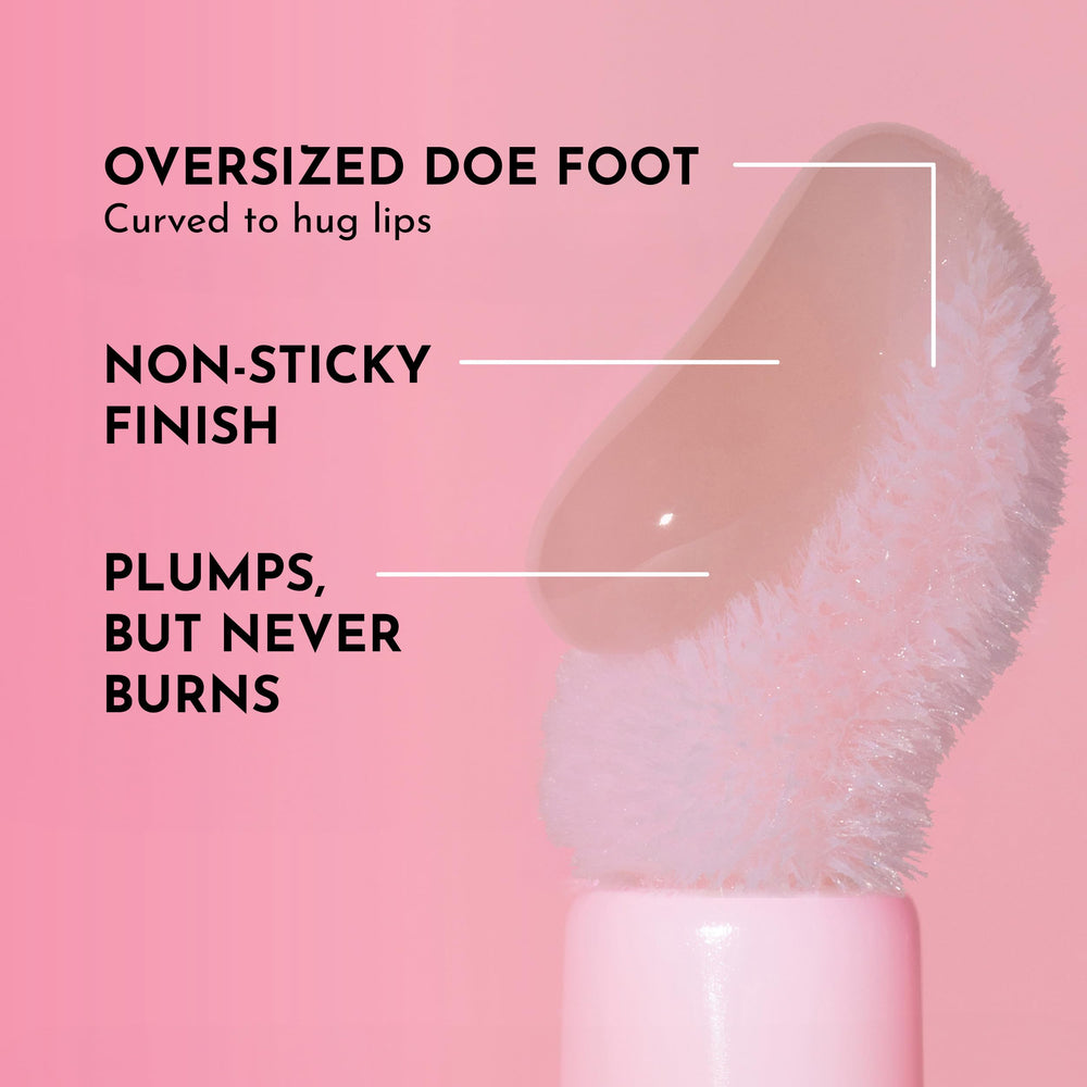LAWLESS rosy outlook swatch on fair skin showing glossy finish and visible plump benefit