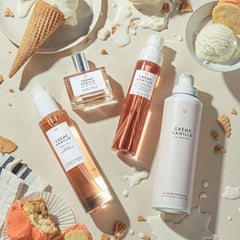 Le Monde Gourmand body oil being massaged into skin for instant hydration