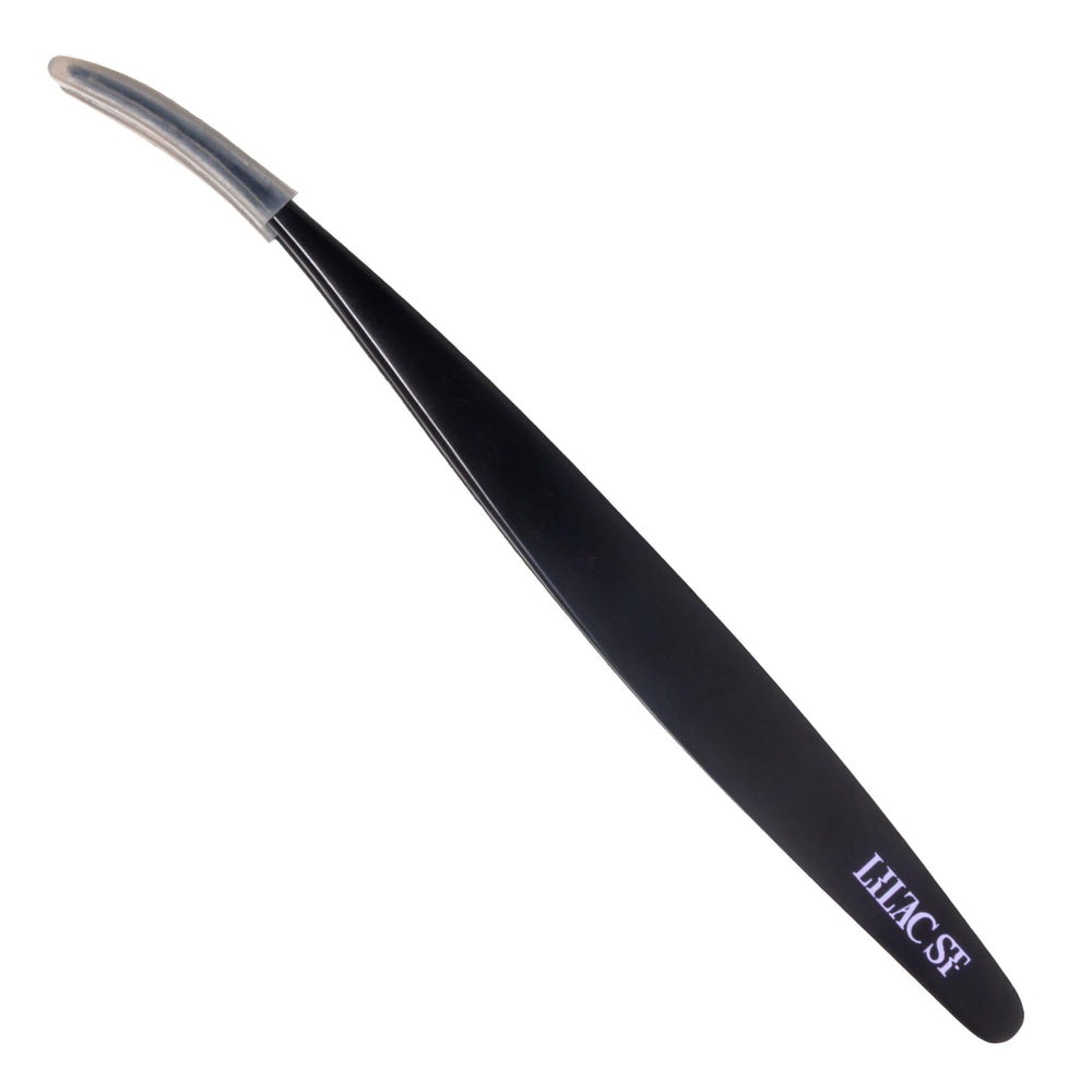 Lilac St. front view of black lash applicator showing ergonomic curve and sleek finish, improved precision