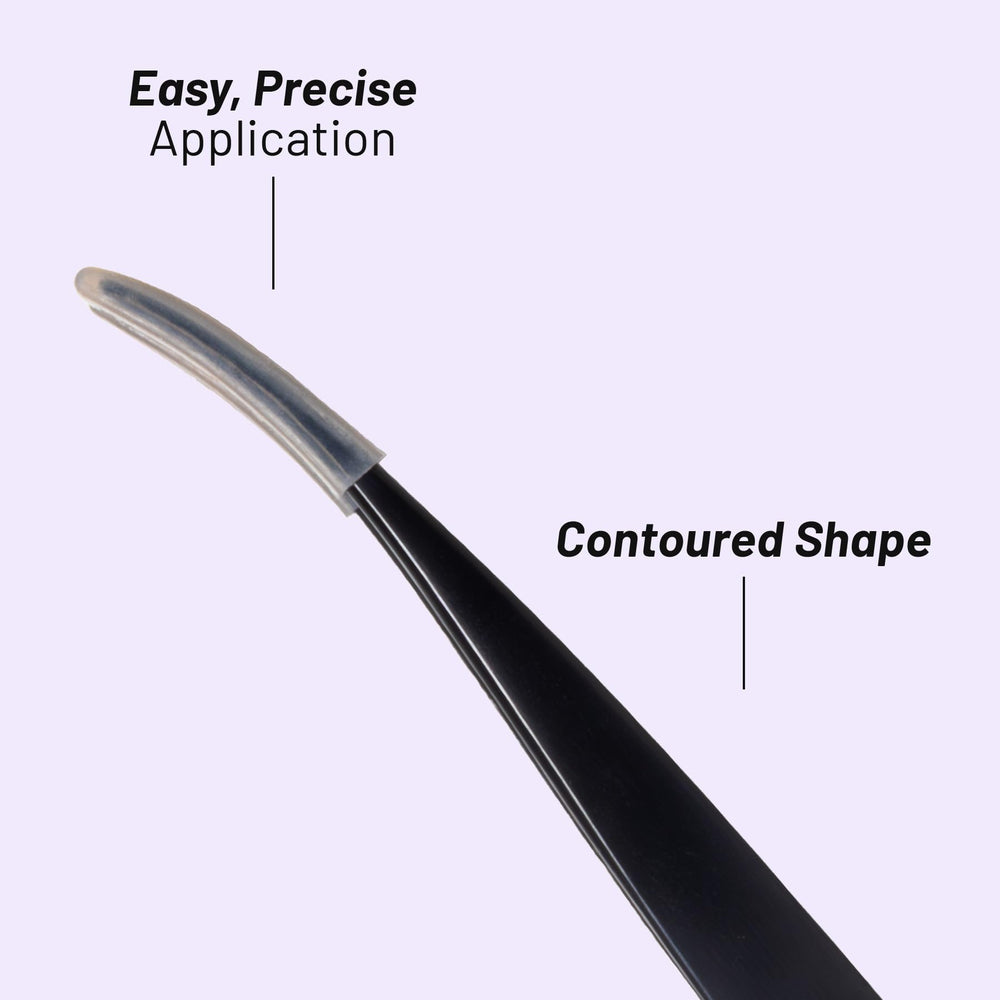 Lilac St. applicator on vanity with lashes and glue highlighting organized, professional setup