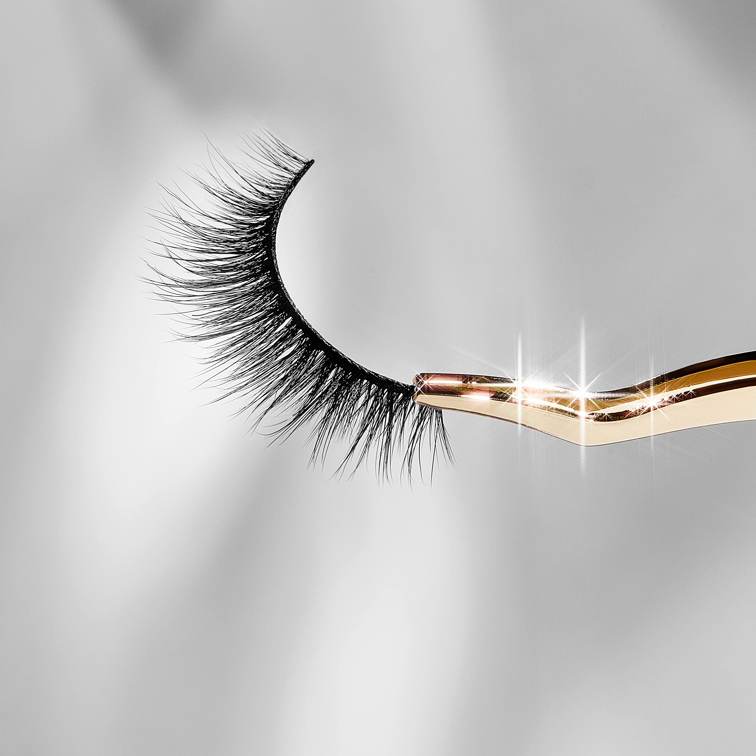 Lilly Lashes beside ruler showing 13mm length for subtle eye lift