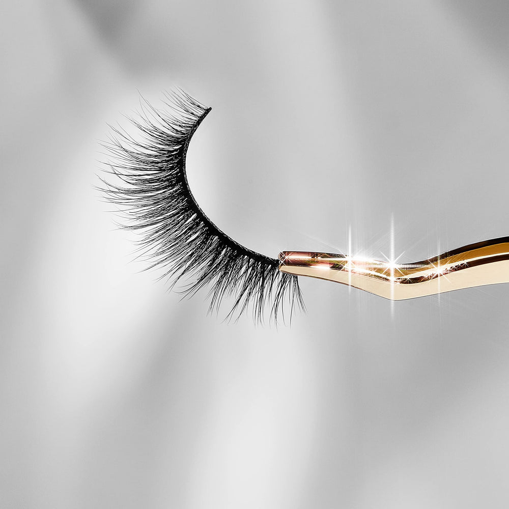 Lilly Lashes beside ruler showing 13mm length for subtle eye lift