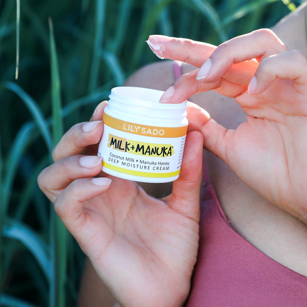 LILY SADO moisturizer in hand demonstrating compact travel size
