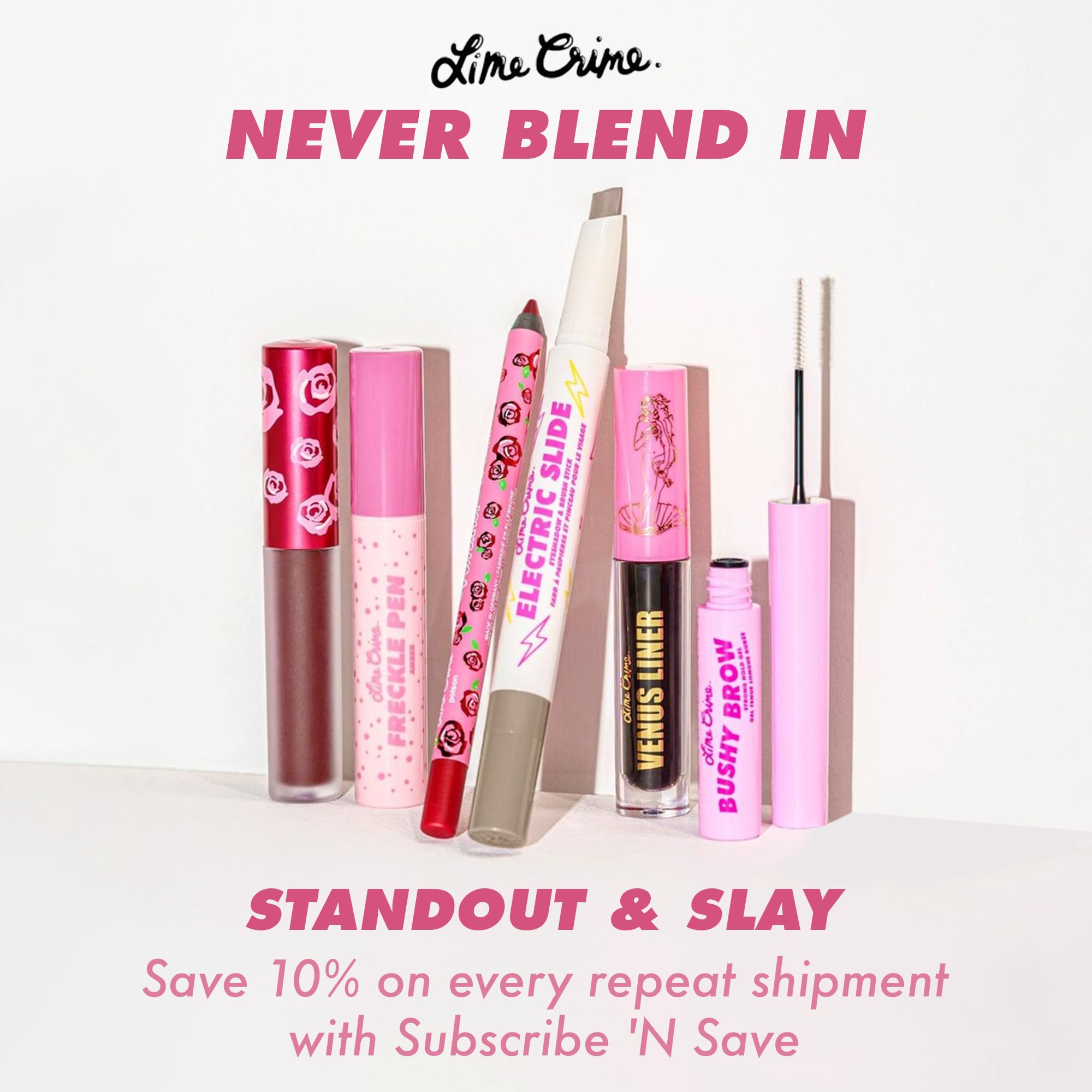 Hand holding a strand colored with Lime Crime Genie to show length and coverage scale
