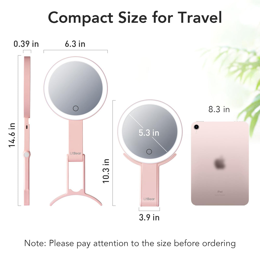 LitBear next to hand for size comparison showing compact travel-friendly benefit