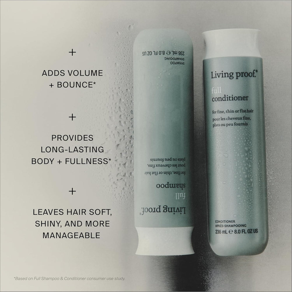 Living Proof applying shampoo to wet hair to boost root lift and volume