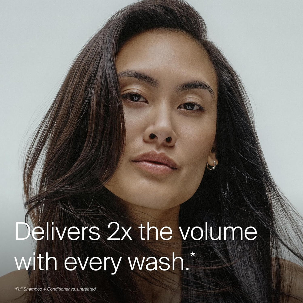 Living Proof shampoo lather texture demonstrating gentle cleansing benefit