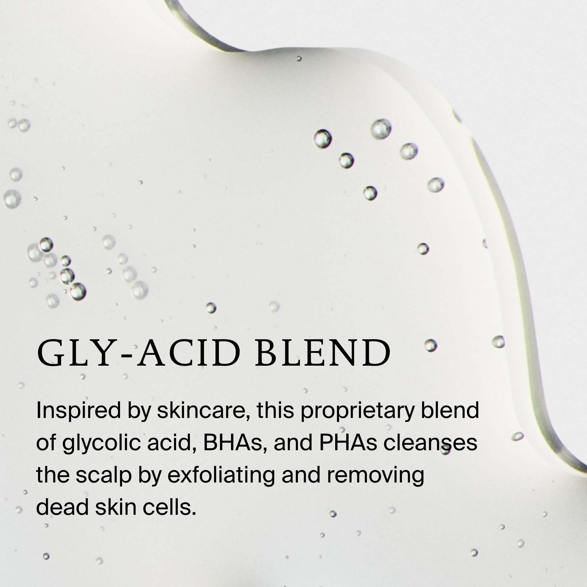 Living Proof exfoliator held in hand to show compact travel-friendly size