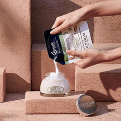 L'OCCITANE refill pouch displayed for eco-friendly replenishing benefit