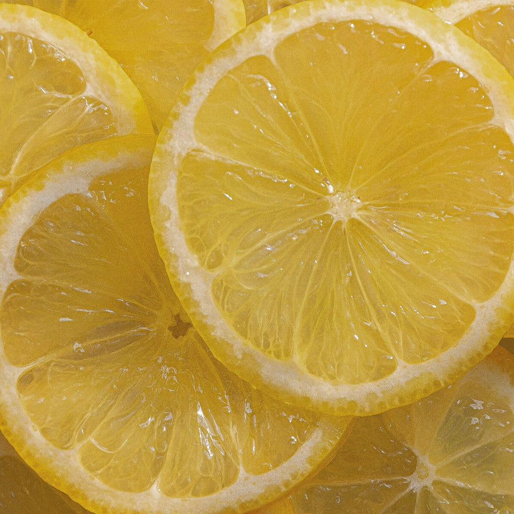 Close-up of L'Occitane label on shampoo bottle highlighting verbena and citrus ingredients benefits