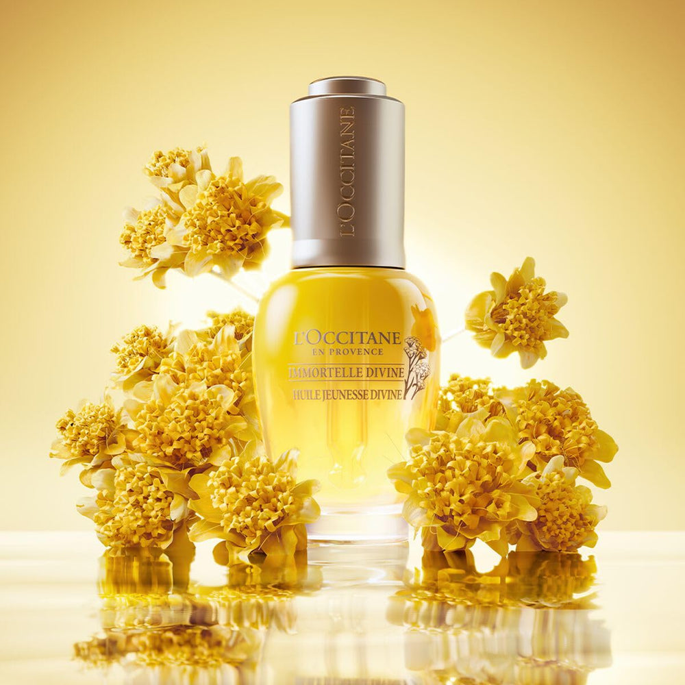 L'OCCITANE dropper releasing oil highlighting silky texture and quick absorption