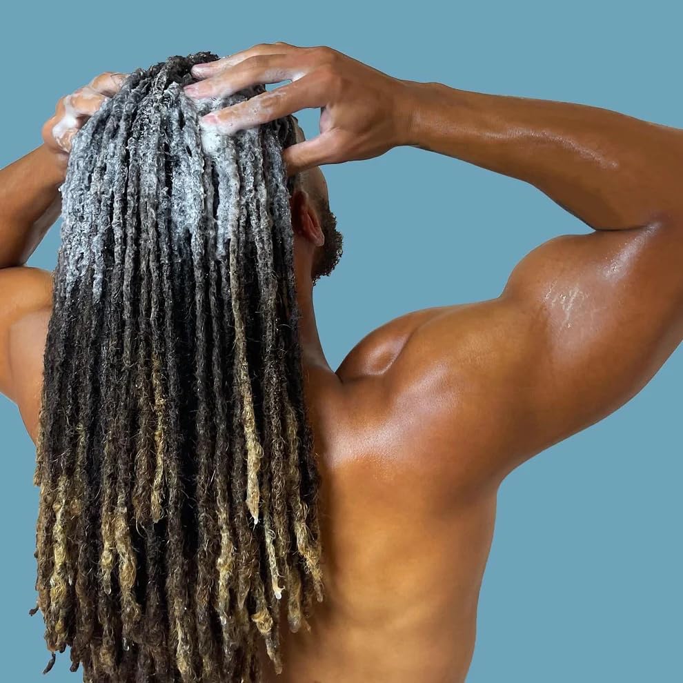 LOCssentials shampoo poured into hands demonstrating easy application benefit