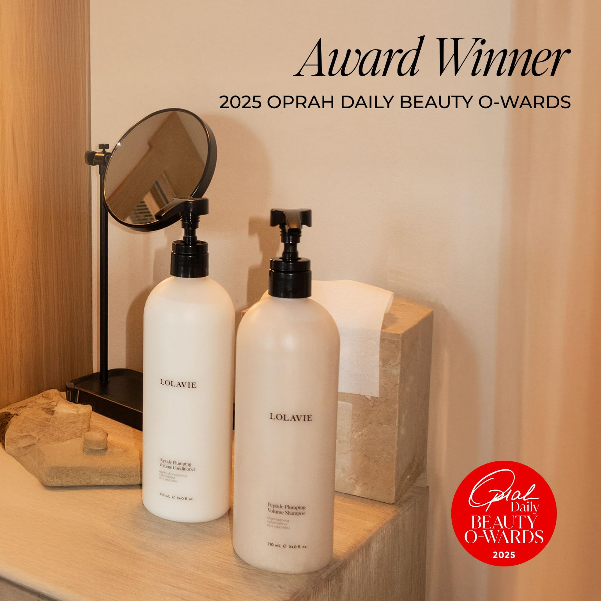 LolaVie applying conditioner in shower showing how to use mid-lengths to ends
