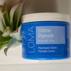 Loma pomade on bathroom counter in lifestyle scene showing everyday convenience benefit