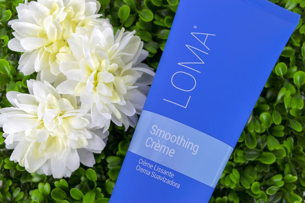 Loma smoothing crème in hand small amount demonstrating product economy and control