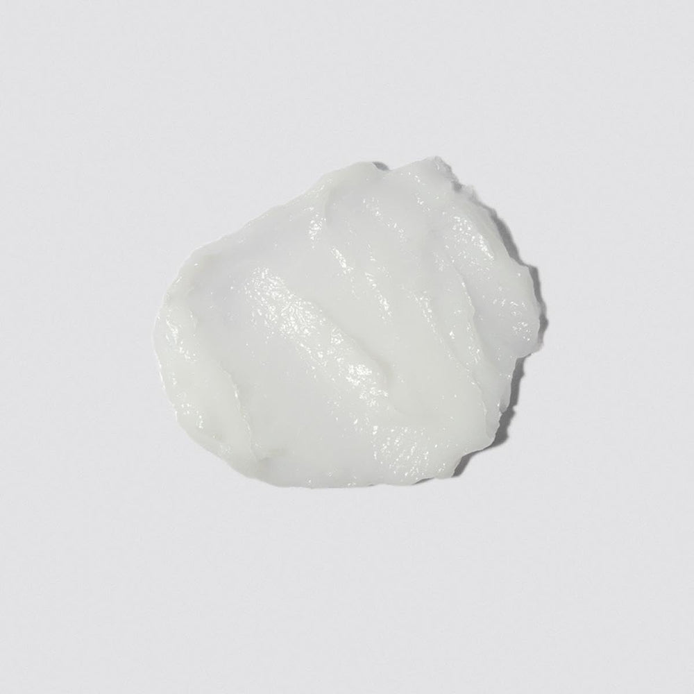 Loma smoothing crème texture close-up demonstrating lightweight sheen and spreadability