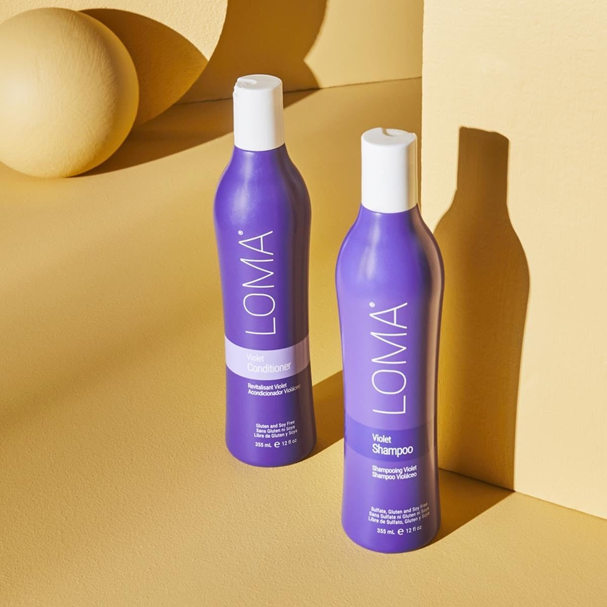 Loma violet shampoo creamy pour texture demonstrating gentle moisturizing action