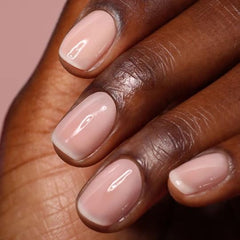 LONDONTOWN brush stroking on nail for high-gloss protective finish