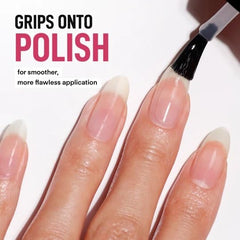 LONDONTOWN product in use applying base coat for quicker manicures and better adhesion