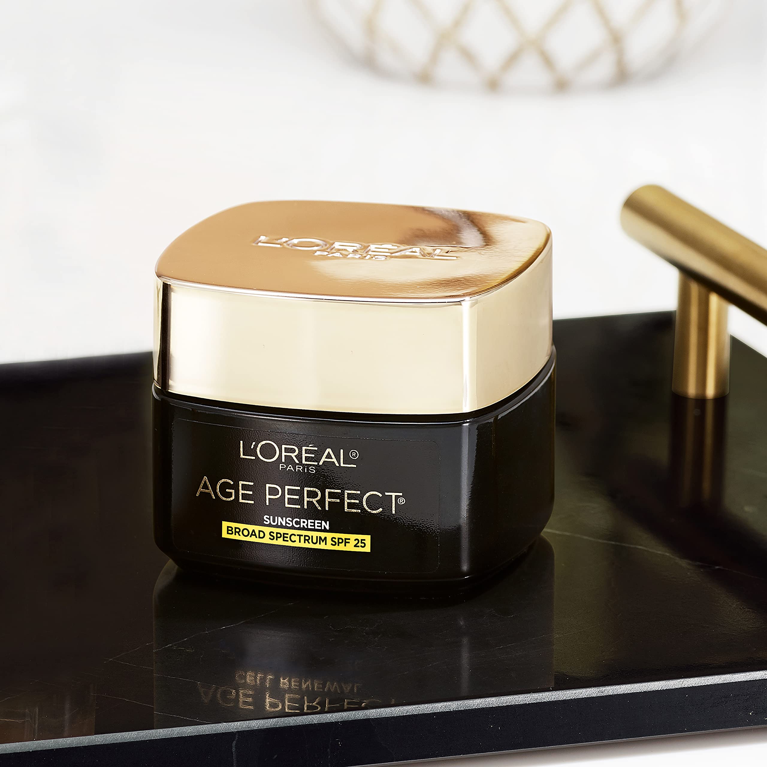 L'Oreal Paris jar next to ruler for size comparison and travel-friendly convenience