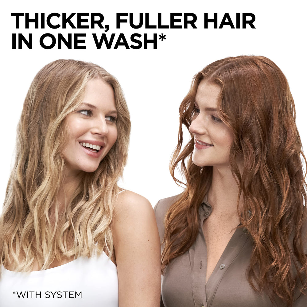L'Oreal Paris conditioner being applied to wet hair showcasing smooth detangling and instant root lift benefit