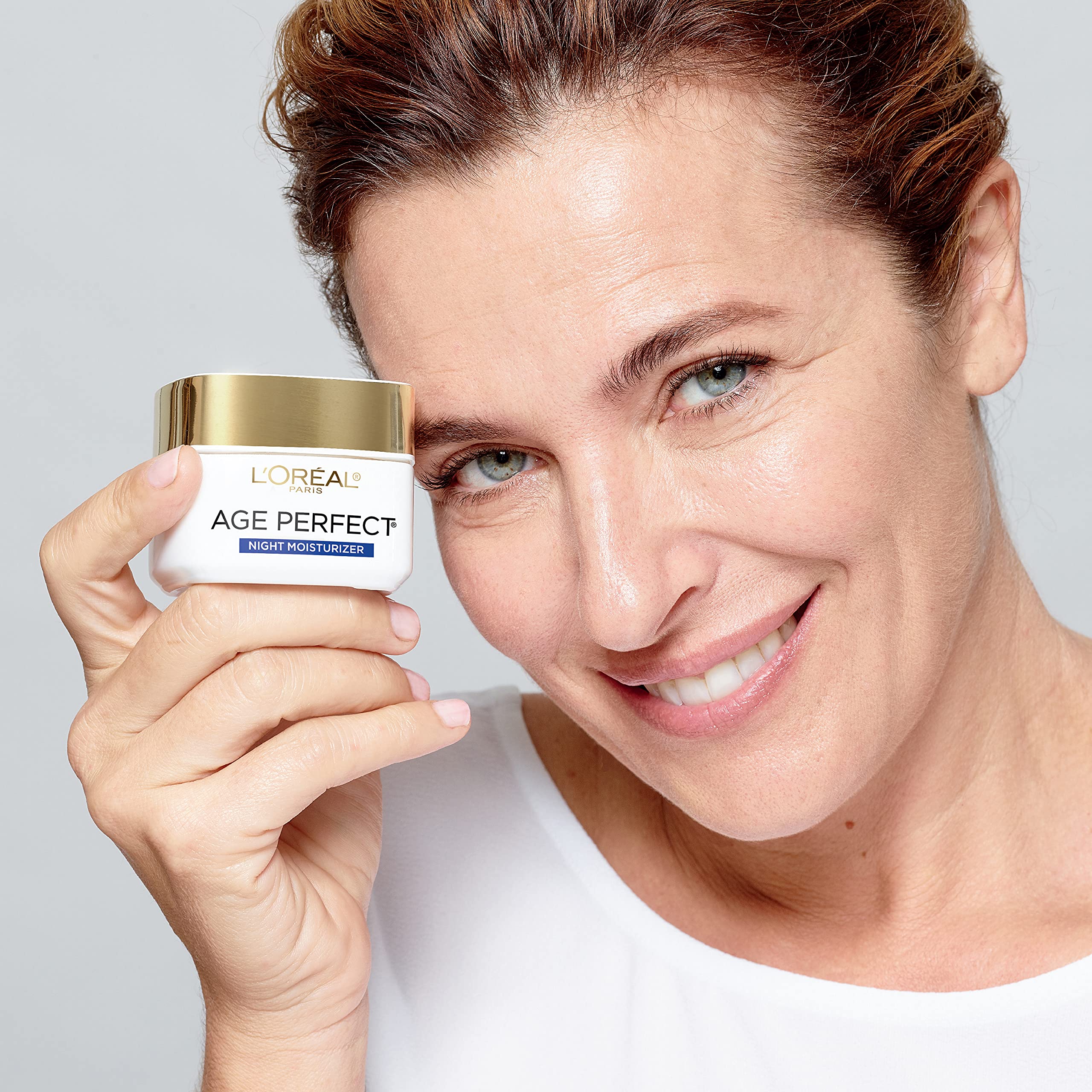 L'Oreal Paris jar with other Age Perfect items showing skincare routine benefit