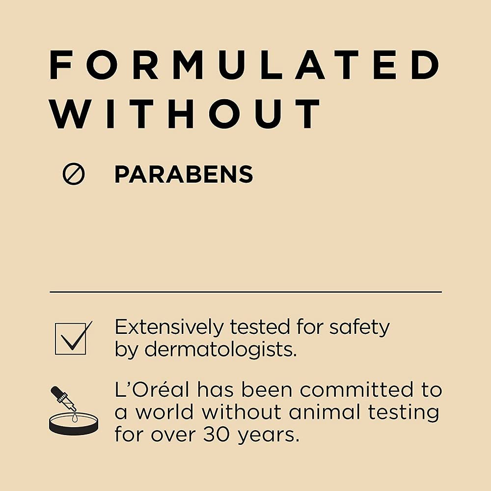 Applying L'Oreal Paris cream to neck area to demonstrate firming routine benefit