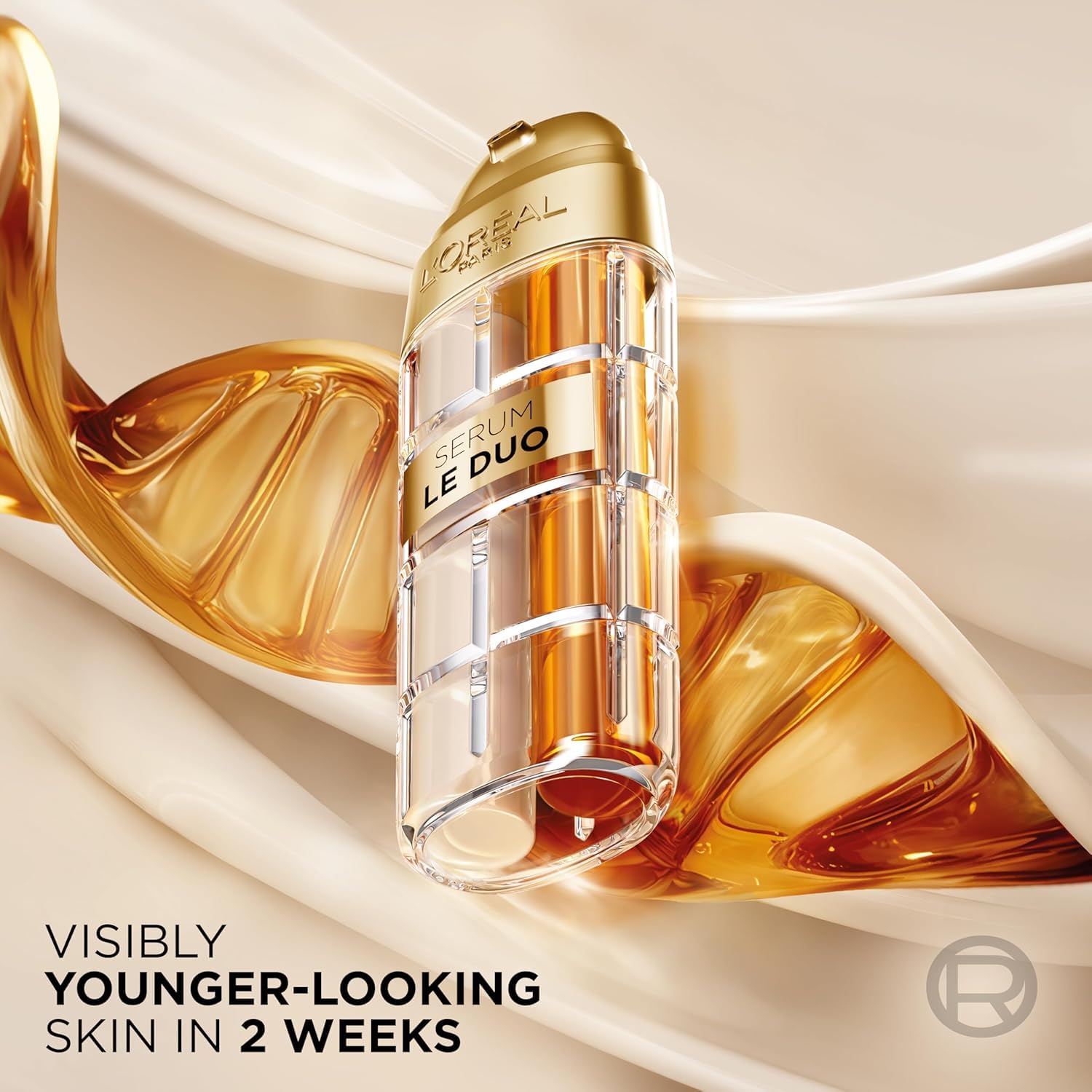 L'Oreal Paris bottle held in hand showing scale and easy daily use benefit
