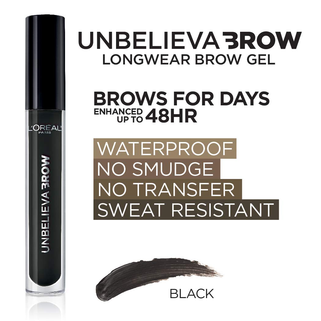 L'Oreal Paris tube in hand for size scale and travel-friendly convenience