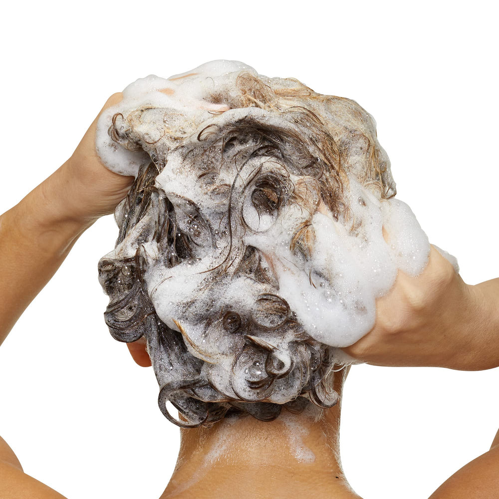 L'Oréal Professionnel Blondifier on bathroom shelf styled for salon-at-home routine