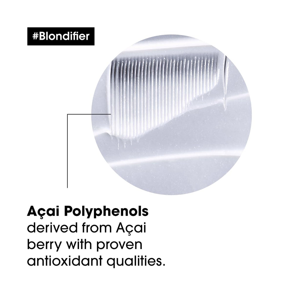 L'Oréal Professionnel Paris applying mask to mid-lengths to boost smoothness
