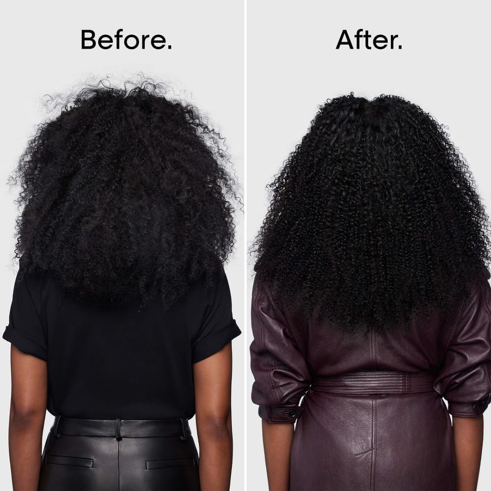 L'Oréal Professionnel product being applied to damp curls for improved definition