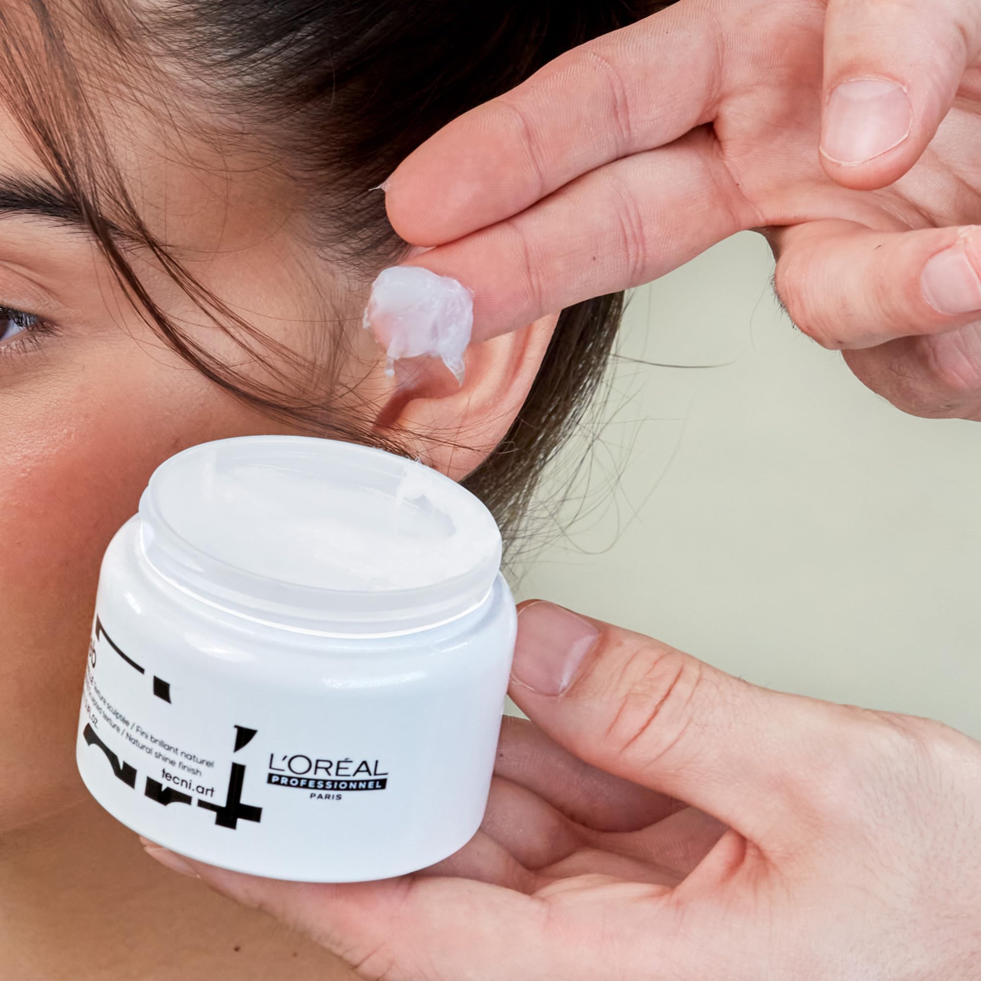 Close-up of side label on L'Oréal Professionnel product showing ingredient clarity benefit