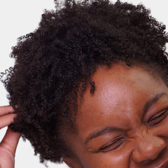 Love Ur Curls container on dresser in natural light for everyday styling convenience