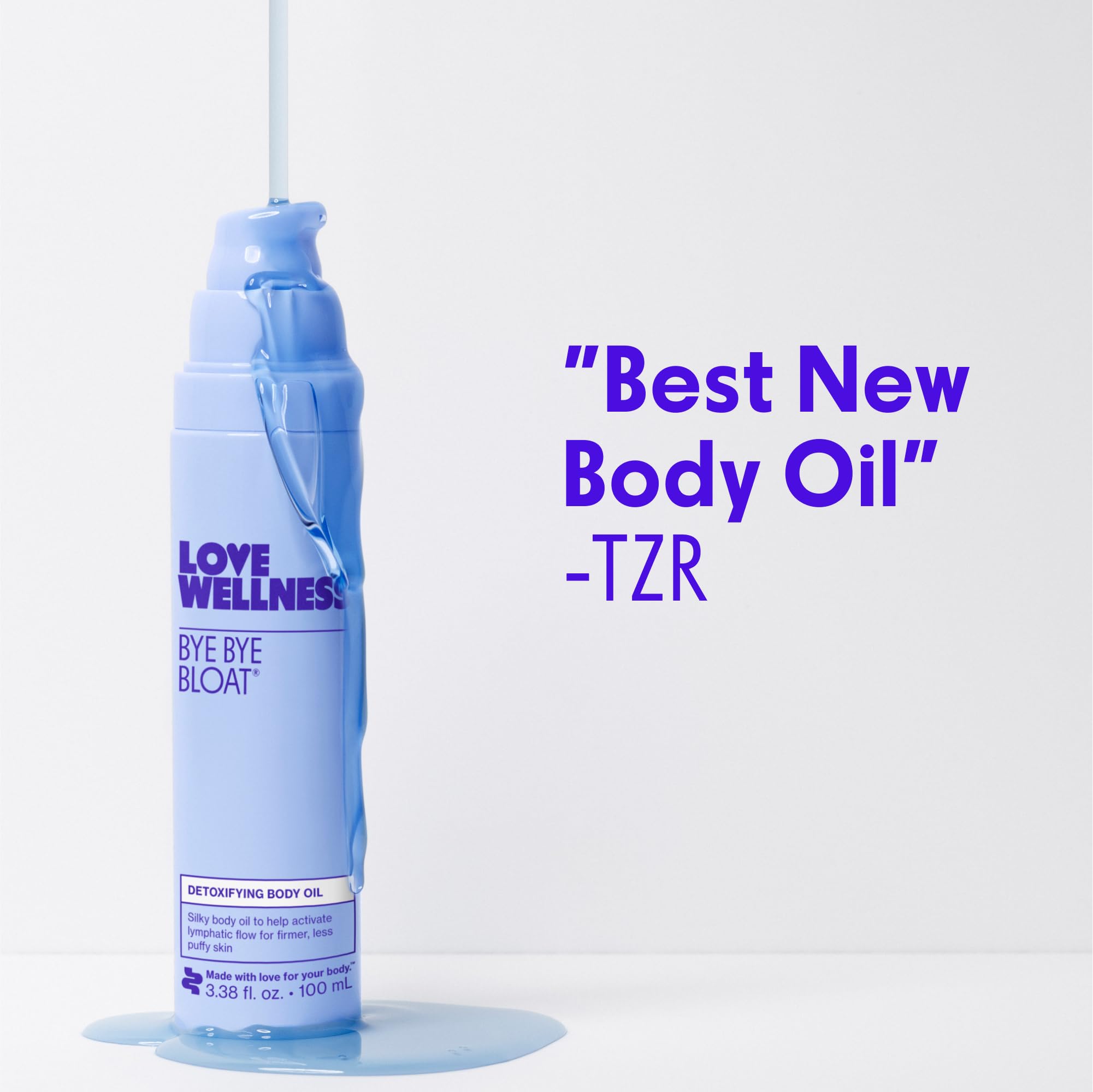 Love Wellness 100 mL bottle next to common items to show compact scale