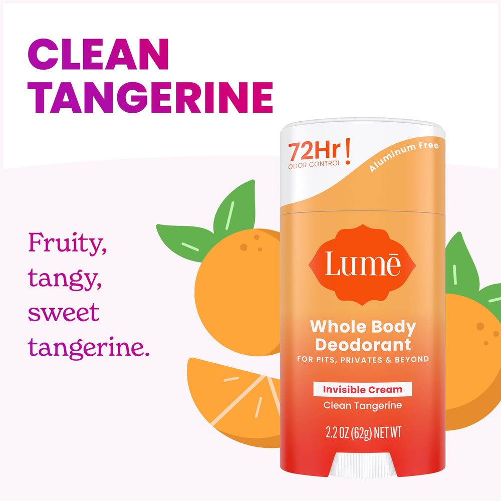 Lume clean tangerine stick in hand demonstrating compact travel-friendly size