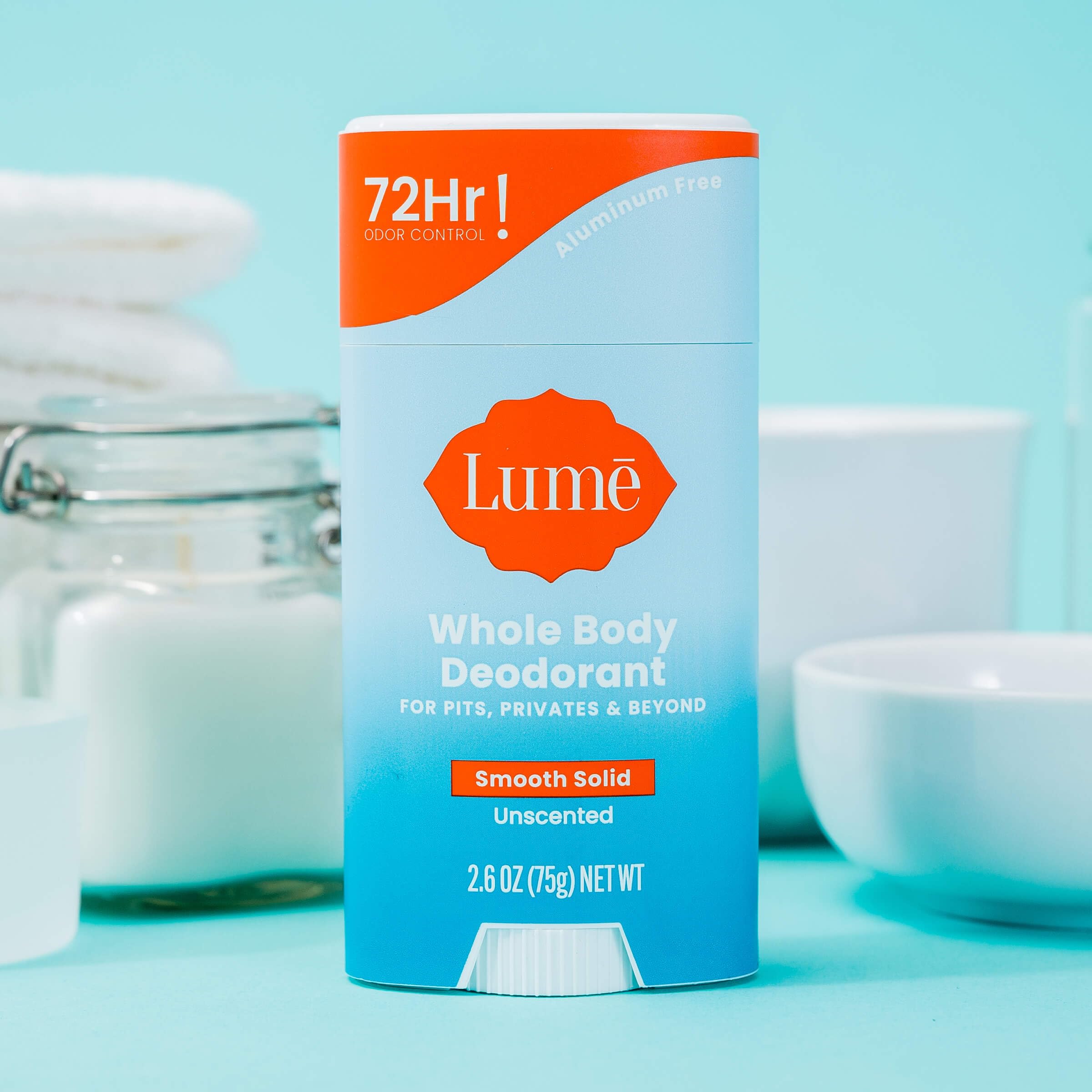 Lume stick in gym bag portraying portable odor defense for active lifestyles