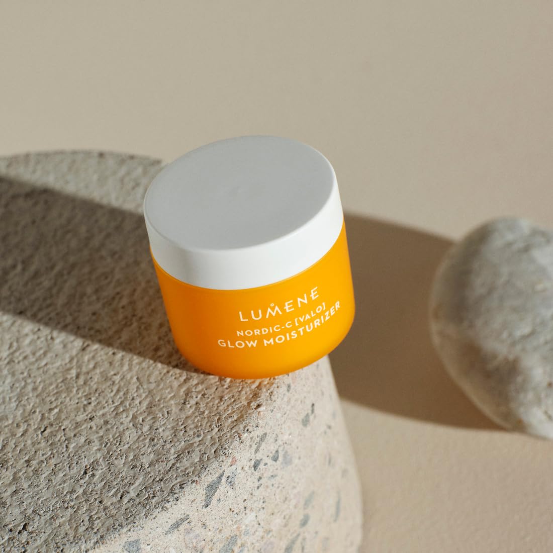 Lumene Nordic-C 1.7 oz size comparison showing travel-friendly volume