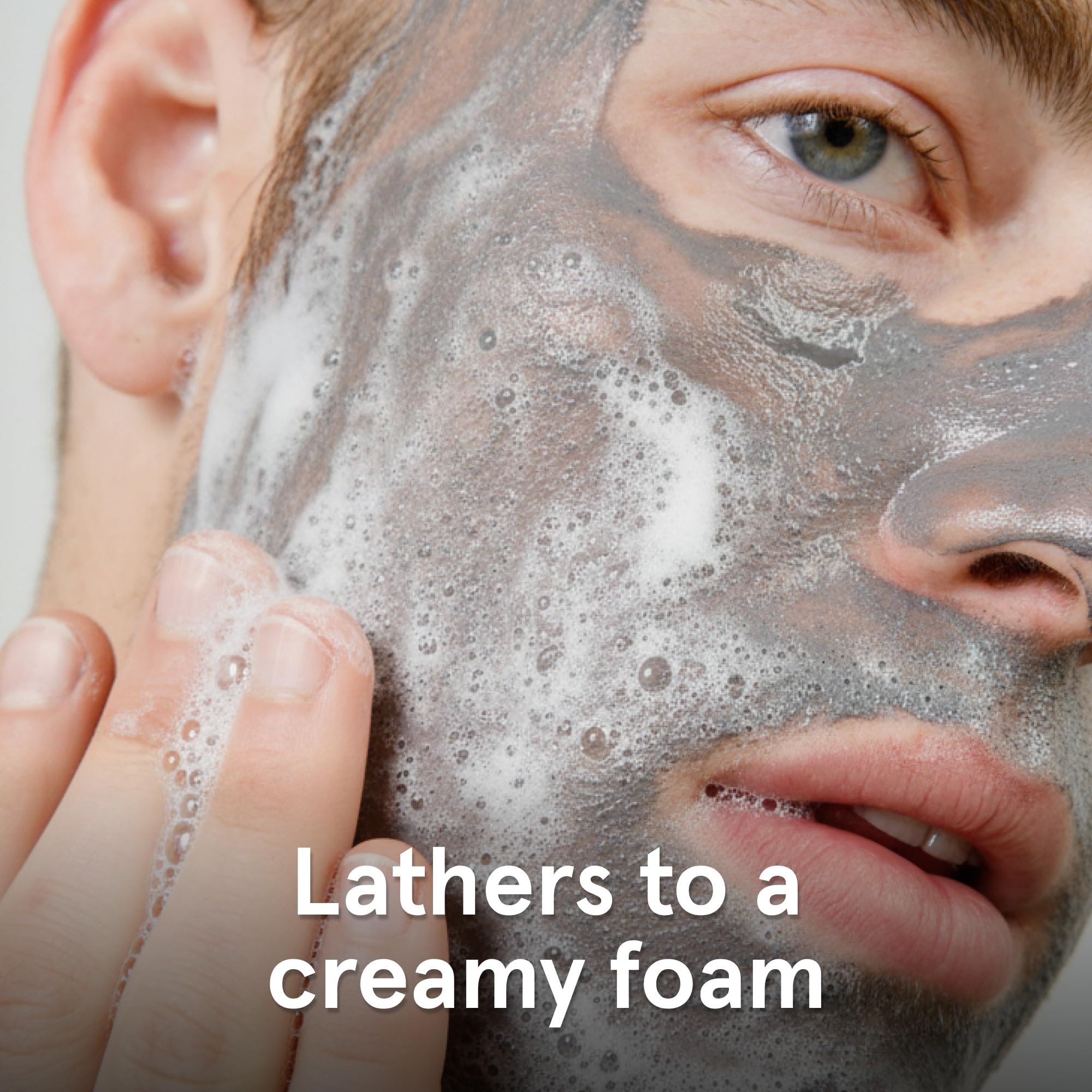 Lumin charcoal foam texture close-up showing gentle effective lather