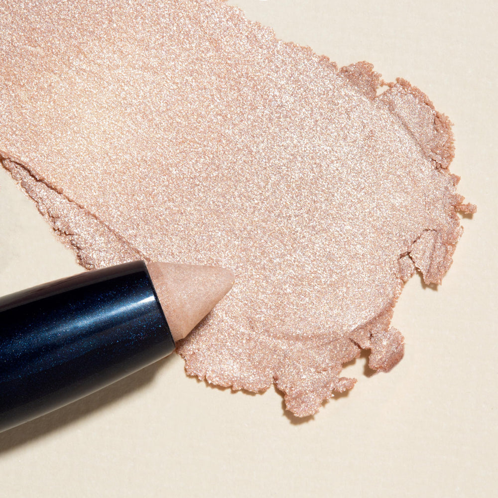 Lune+Aster with jojoba oil droplet emphasizing nourishing, moisturizing benefit