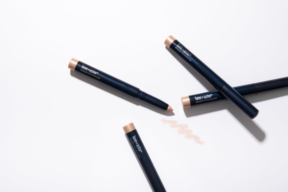 Lune+Aster pencil held in hand showing compact travel-friendly size benefit