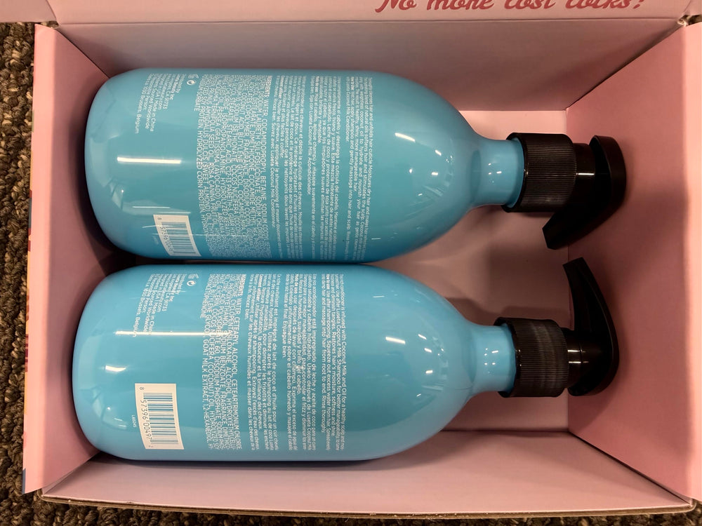 Luseta bottles next to common items showing true 16.9oz size